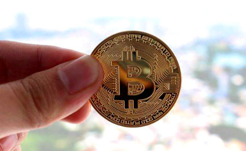 Đồng Bitcoin mạ vàng, được nhiều người lựa chọn để lì xì vào dịp Tết. Với mong muốn mang lại may mắn. Ảnh minh họa.