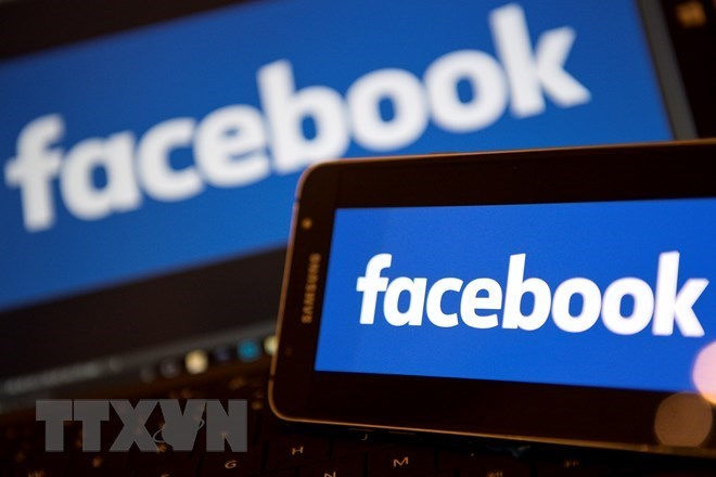 Biểu tượng Facebook tại London, Anh. (Nguồn: AFP/TTXVN).