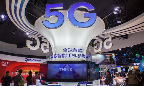 Gian hàng 5G của China Mobile tại triển lãm ở Quảng Châu, tỉnh Quảng Đông,  Trung Quốc tháng 11/2017. Ảnh: VCG