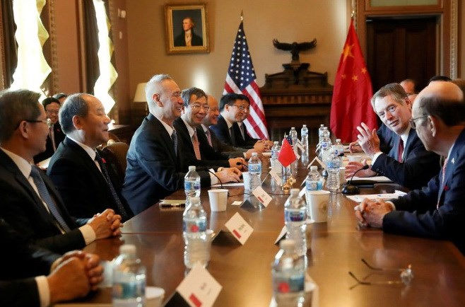 Quan chức Mỹ và Trung Quốc đàm phán. Ảnh: New Straits Times