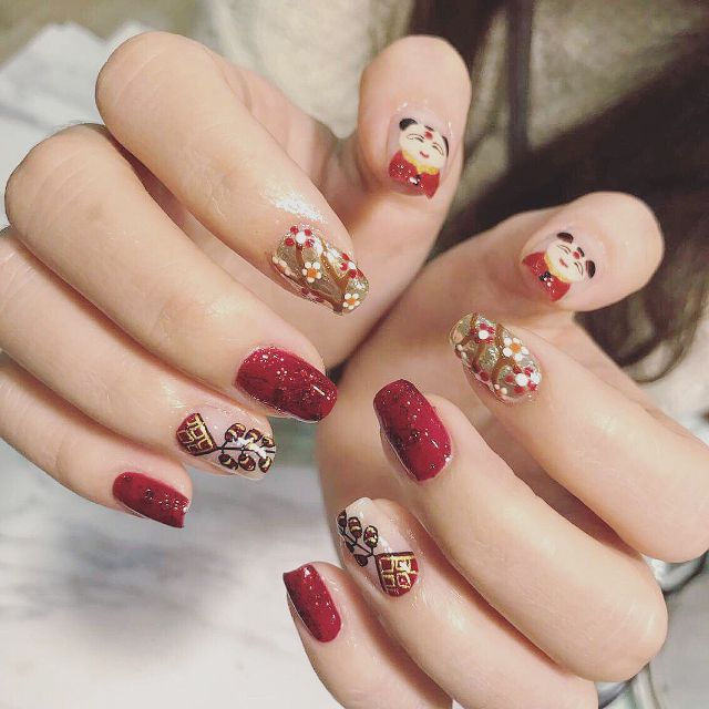 Những mẫu nail hoa mai điệu đà cho tết 2019 