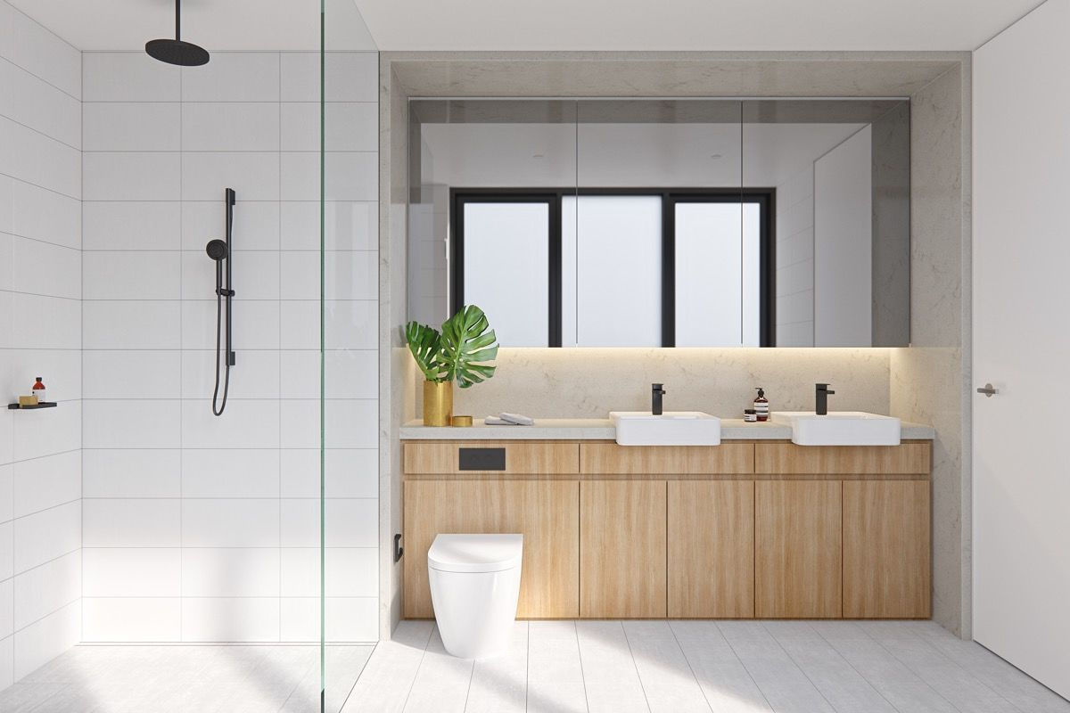 Mẫu phòng tắm đẹp này gợi cho người ta cảm giác như đang trải nghiệm dịch vụ spa đắt tiền. Sử dụng chất liệu gỗ đã mang tới một không gian phòng tắm đơn giản, tinh tế.