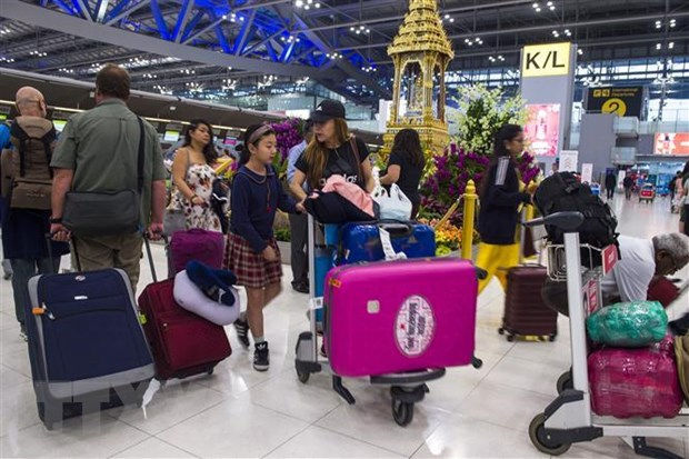  Khách du lịch tại sân bay Suvarnabhumi ở Bangkok, Thái Lan, ngày 30/1/2019. (Nguồn: AFP/TTXVN)
