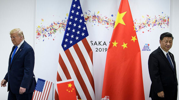 Tổng thống Mỹ Donald Trump và Chủ tịch Trung Quốc Tập Cận Bình tại cuộc gặp ở Osaka, Nhật Bản tháng 6/2019 - Ảnh: AFP.