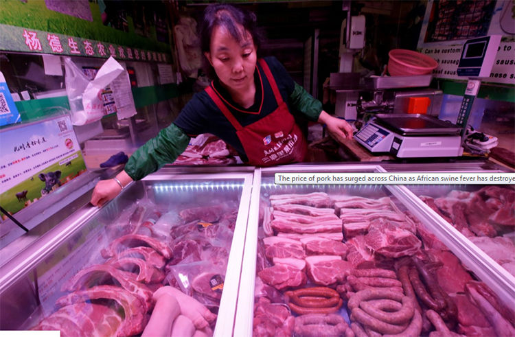 Mộ quầy bán thịt lợn tại Trung Quốc. Ảnh: Reuters.