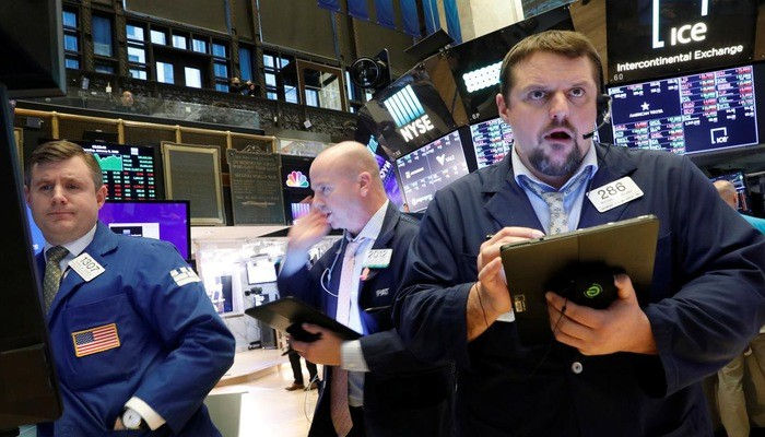 Các nhà giao dịch trên sàn NYSE- Ảnh: Reuters.