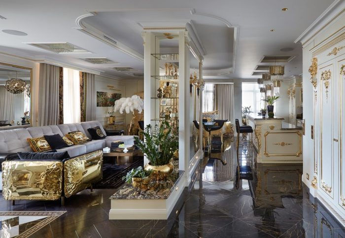 Bình hoa, đệm và các điểm nhấn nội thất khác của Maison Milan tràn ngập khắp không gian phòng khách của căn hộ. 