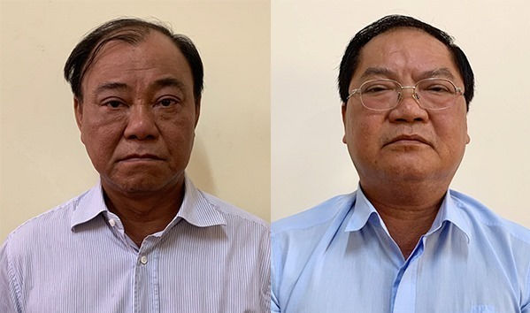   Ông Lê Tấn Hùng (trái) và Nguyễn Thành Mỹ lúc bị bắt, tháng 7/2019. Ảnh: Bộ Công an.  