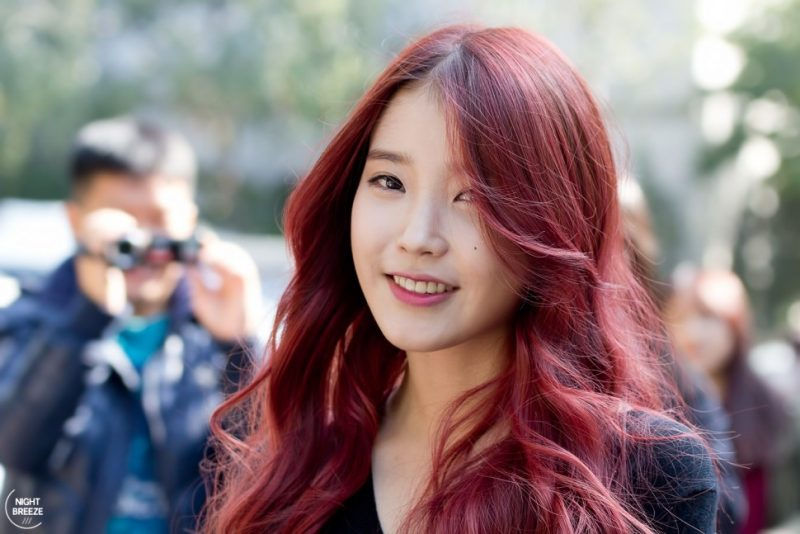 Màu đỏ cam sẽ giúp bạn toả sáng giữa vô vàn các mái tóc phổ biến khác.  Ảnh: Kpop News. 