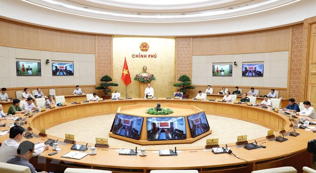 Thủ tướng Nguyễn Xuân Phúc chủ trì họp Thường trực Chính phủ về phòng chống dịch COVID-19. Ảnh: TTXVN.