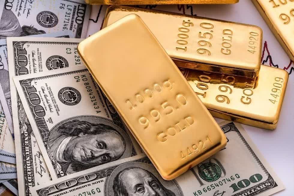 Giá vàng thế giới vượt đỉnh lịch sử 1.923 USD/ounce thiết lập năm 2011 vào ngày 27/7. Ảnh: Reuters.