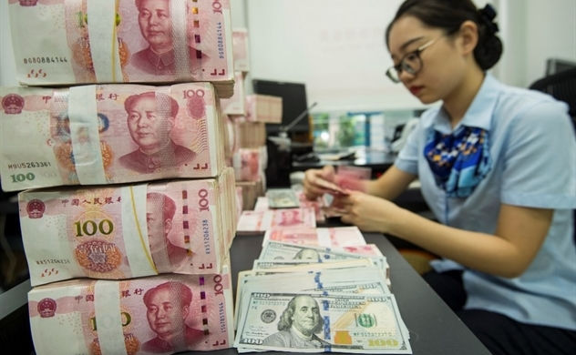 Chưa hẳn là tin tốt cho đồng tiền đang mạnh lên của Trung Quốc. Nguồn ảnh: AFP