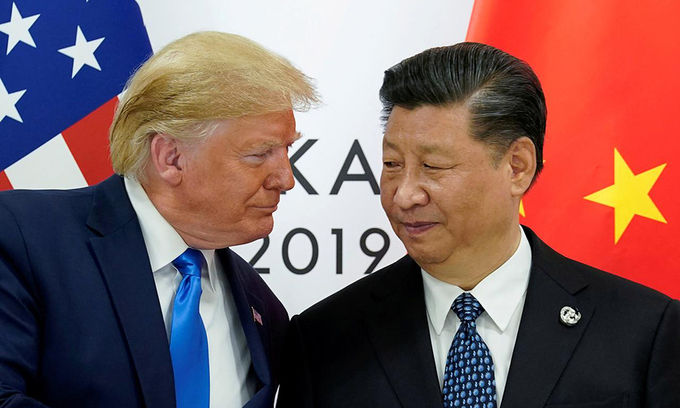Tổng thống Donald Trump (trái) và Chủ tịch Tập Cận Bình tại hội nghị G20 ở Osaka, Nhật Bản, hồi tháng 6/2019. Ảnh: Reuters.