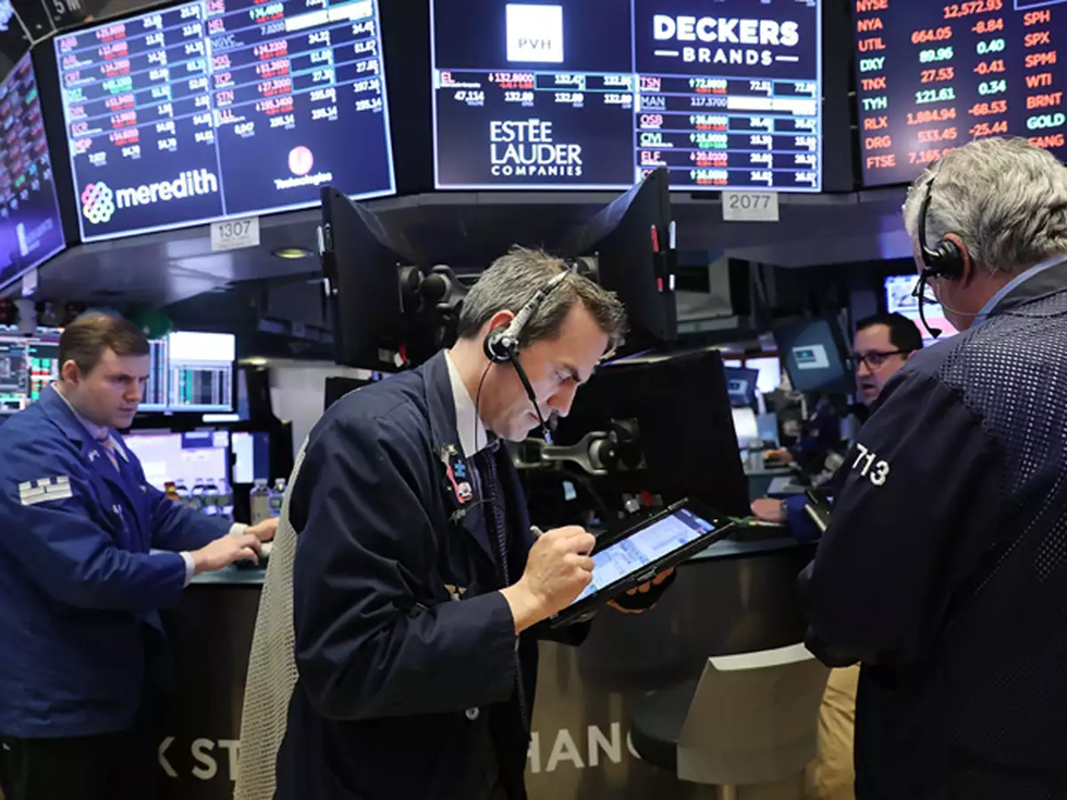 Thị trường  chứng khoán Mỹ  mất đà tăng sau khi  Tổng thống Trump  mắc COVID-19. Ảnh: CNBC