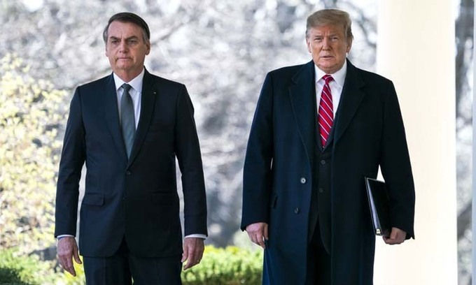 Tổng thống Mỹ Donald Trump (phải) và người đồng cấp Brazil Jair Bolsonaro tại Nhà Trắng hồi tháng 3/2019. Ảnh: AFP.