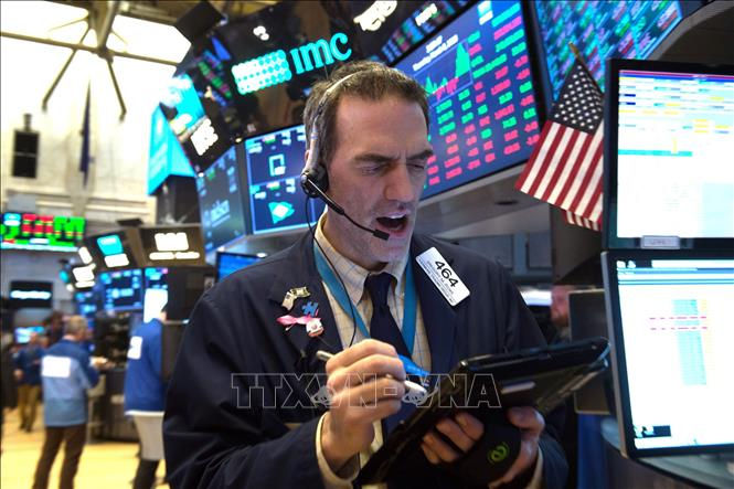   Dow tăng gần 200 điểm, đạt mức cao kỷ lục để kết thúc năm 2020. Ảnh: TTXVN  