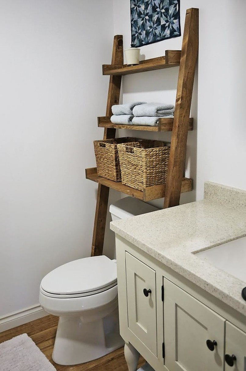 ladder-storage-shelf-leaning-on-the-wall-with-wicker-baskets-and-towels-84329.jpg