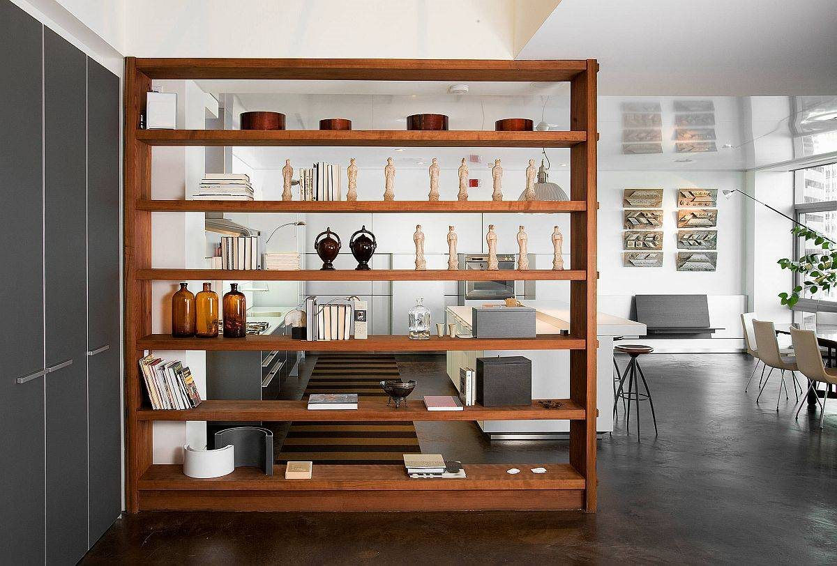 elegant-and-minimal-bookshelf-in-wood-is-just-perfect-for-the-open-plan-living-area-and-neatly-hides-the-kitchen-88160.jpg