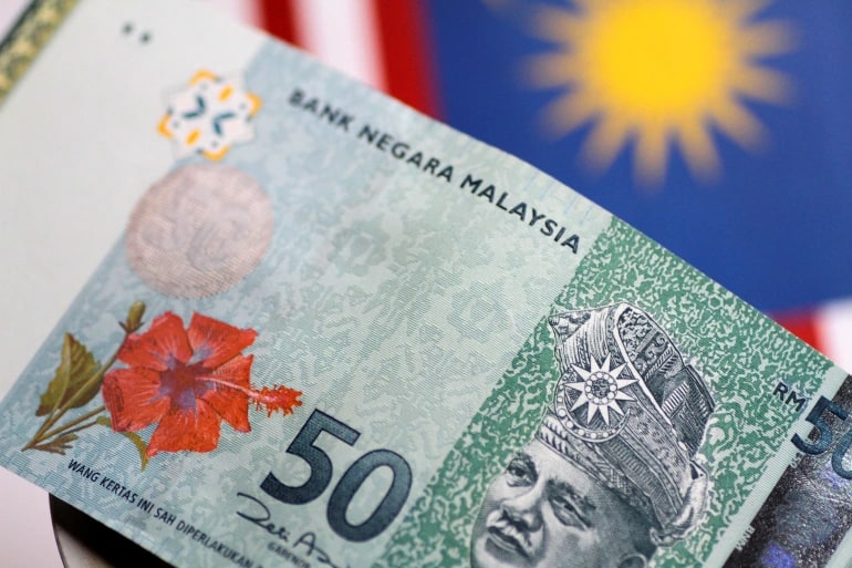 Thị trường chứng khoán và tiền tệ Malaysia suy yếu do không đảng phái nào chiếm được đa số - Ảnh 1.