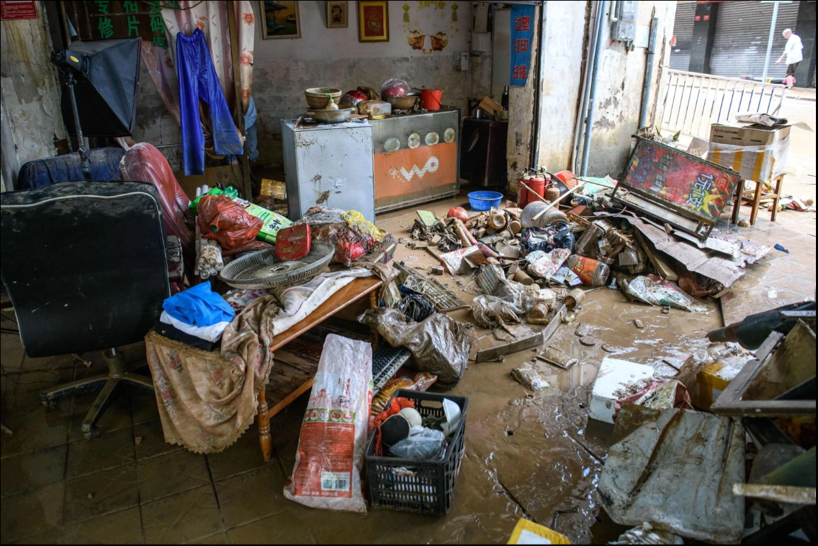 Các tỉnh phía nam của Trung Quốc đang trong tình trạng báo động khi lũ lụt - Ảnh 6.