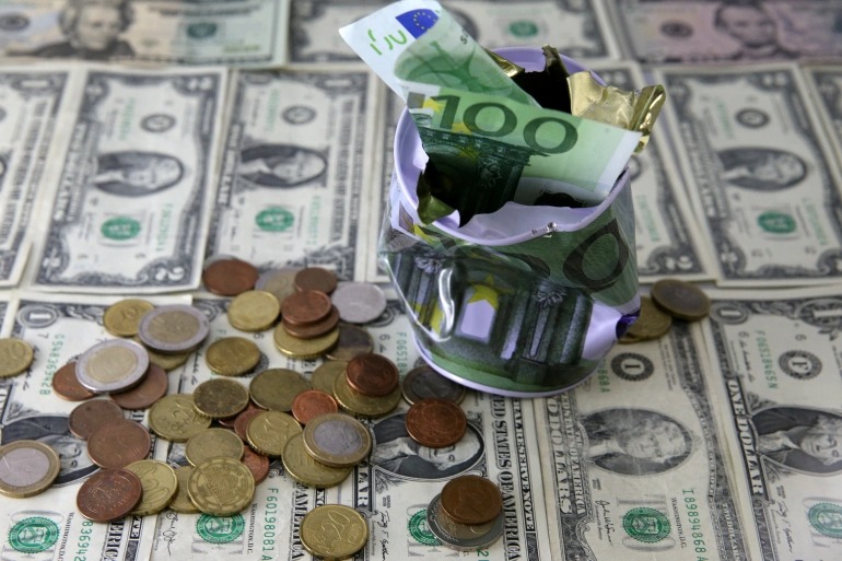Điều gì đã khiến đồng euro ngang giá với đồng đô la Mỹ? - Ảnh 1.