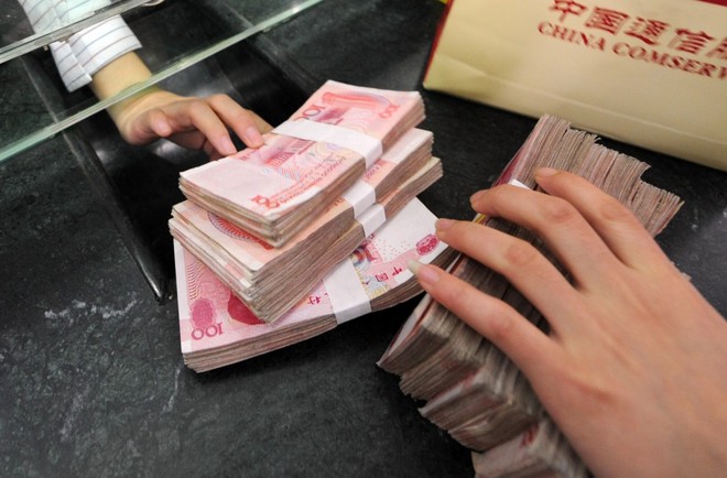 Trung Quốc cắt giảm lãi suất cho vay để vực dậy nền kinh tế - Ảnh 1.