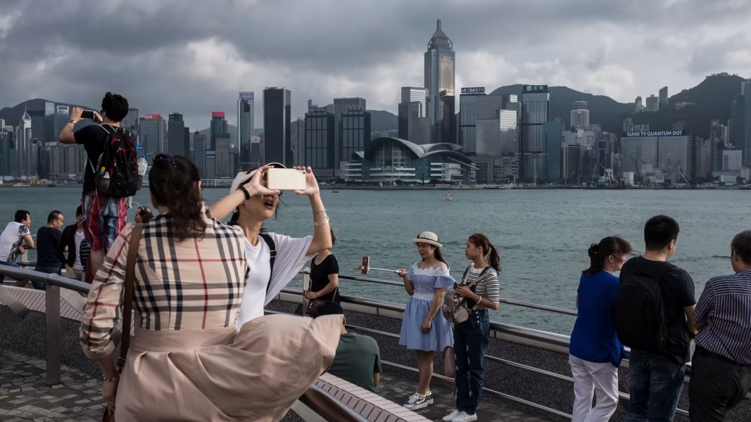 Sự trở lại của khách du lịch Trung Quốc có tác động như thế nào đối với nền kinh tế toàn cầu?   - Ảnh 1.