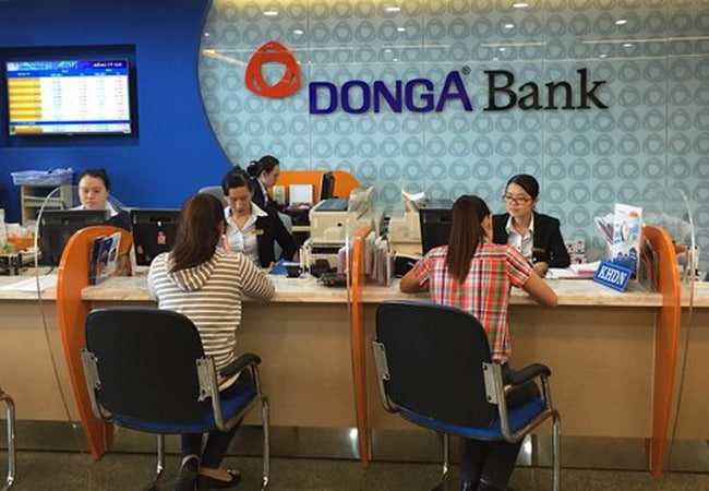 Khẩn trương chuyển giao bắt buộc với DongA Bank- Ảnh 1.