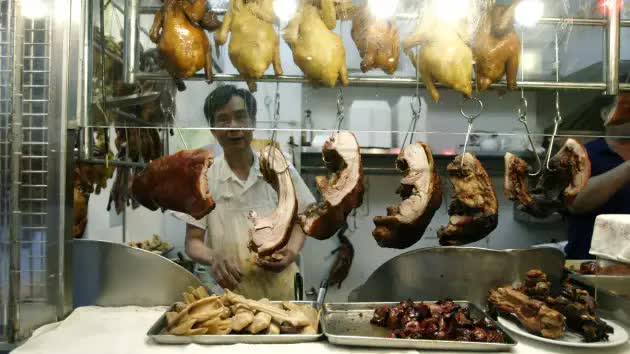 Giá thịt heo lao dốc đẩy nền kinh tế Trung Quốc đến sát bờ vực giảm phát- Ảnh 2.