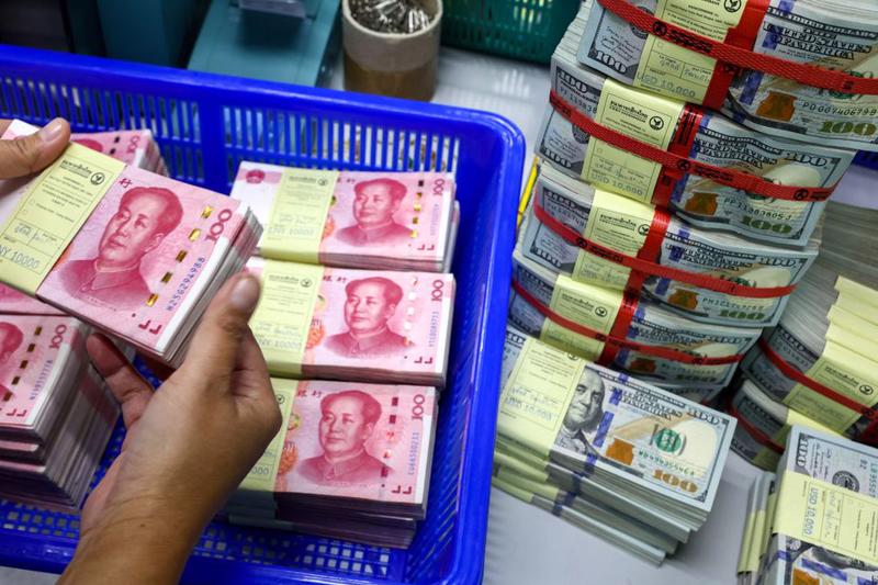 Lần đầu tiên nhân dân tệ vượt USD trong thanh toán xuyên biên giới của Trung Quốc - Ảnh 2.