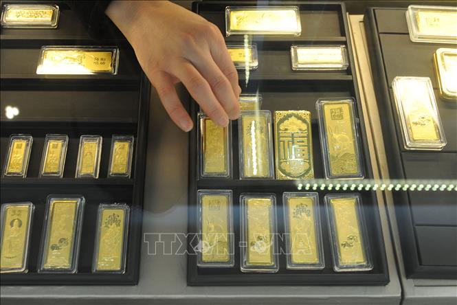 Đồng USD yếu tạo lực đẩy cho vàng- Ảnh 1. Đồng USD yếu tạo lực đẩy cho vàng- Ảnh 1.