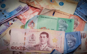 Nền kinh tế Malaysia, Thái Lan chịu thiệt hại khi tiền tệ trượt giá so với đồng USD