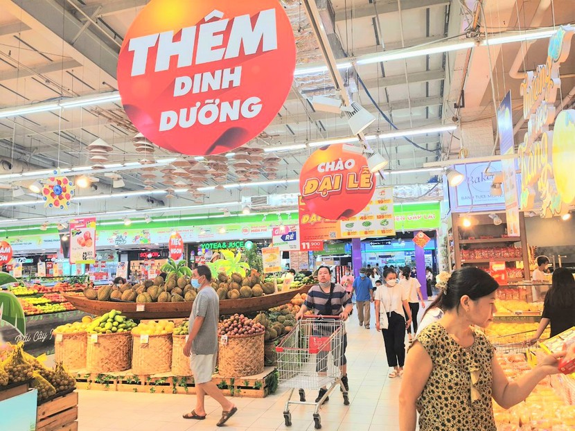 Giá thực phẩm tăng nhẹ, siêu thị nhiều khuyến mãi - Ảnh 1.