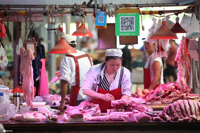 Trung Quốc lại chuẩn bị mua thịt heo dữ trữ để đẩy giá- Ảnh 1.