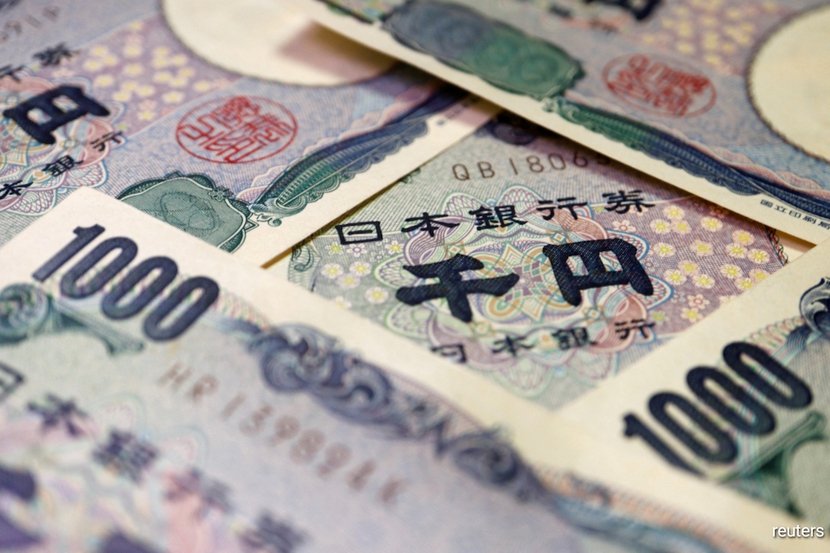 BoJ quyết định giữ nguyên lãi suất, đồng yên chạm đáy mới trong 34 năm- Ảnh 1.