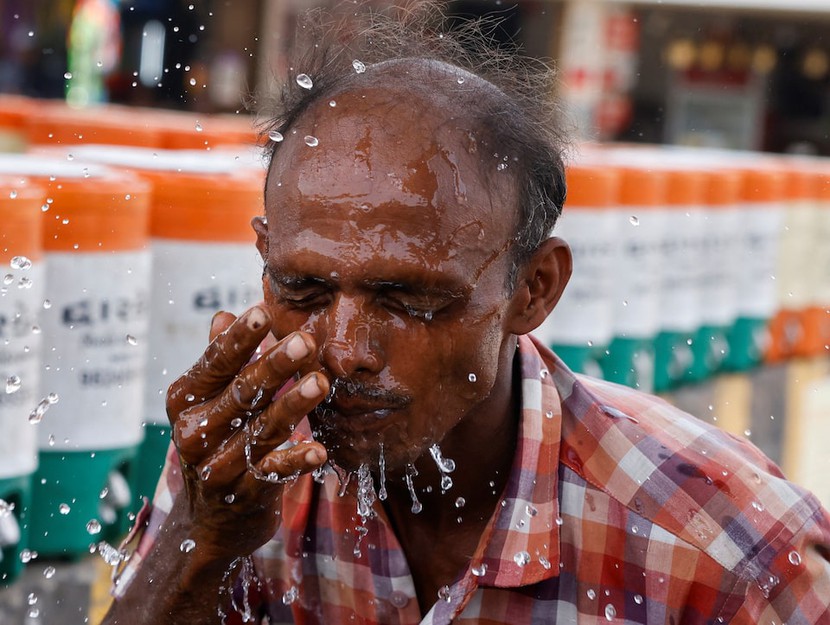 Nhiệt độ thủ đô Ấn Độ tăng cao kỷ lục- Ảnh 1.