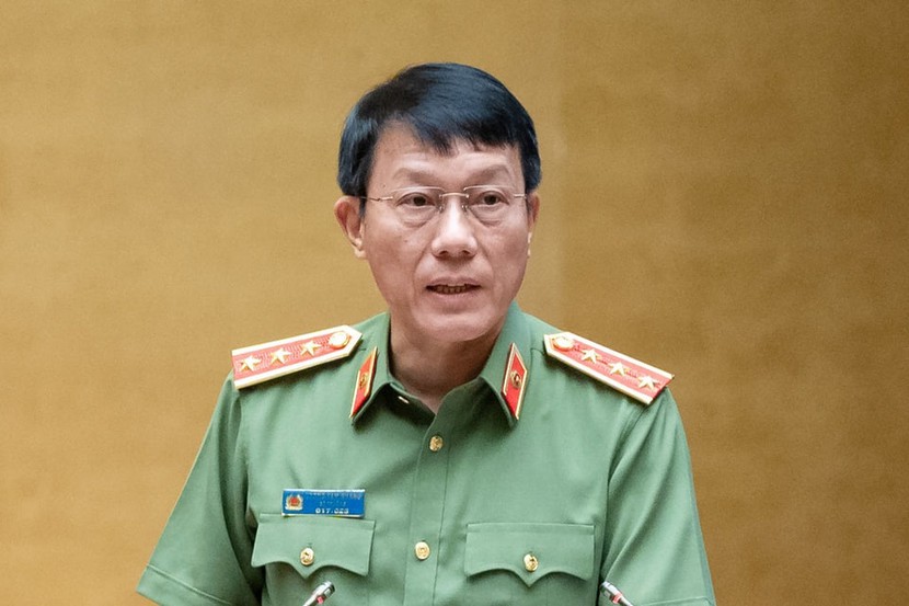 Bộ trưởng Công an Lương Tam Quang trình dự Luật Phòng cháy, chữa cháy- Ảnh 1.