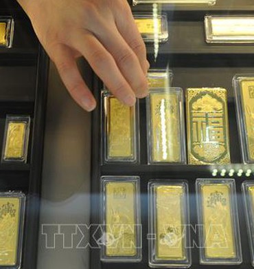 Giá vàng thế giới chạm mức thấp nhất gần ba tuần