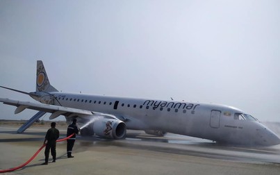 Bị sự cố bánh trước, máy bay Myanmar hạ cánh bằng bụng