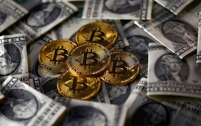 Bitcoin tăng phi mã lên gần 9.000 USD