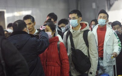Trung Quốc cách ly 10 thành phố, ngăn virus Corona