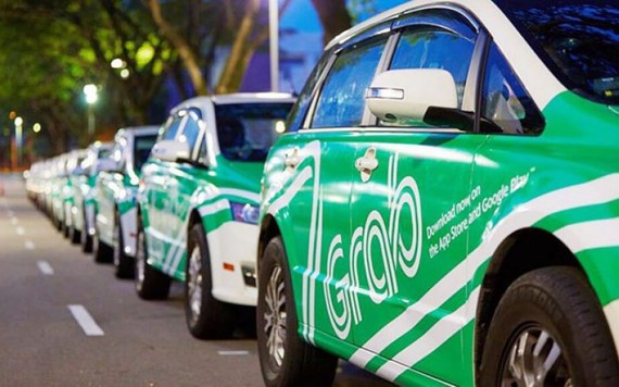 Hà Nội, Sài Gòn cùng kiến nghị dừng Uber, Grab