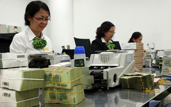 Vietcombank báo lãi gần 11.000 tỷ trong 6 tháng đầu năm